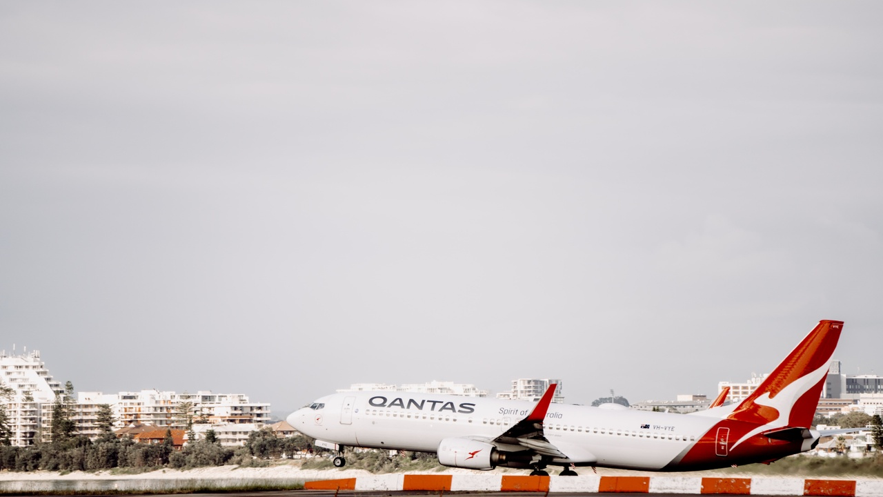 A Qantas aeroplane taking off from Sydney Australia airport